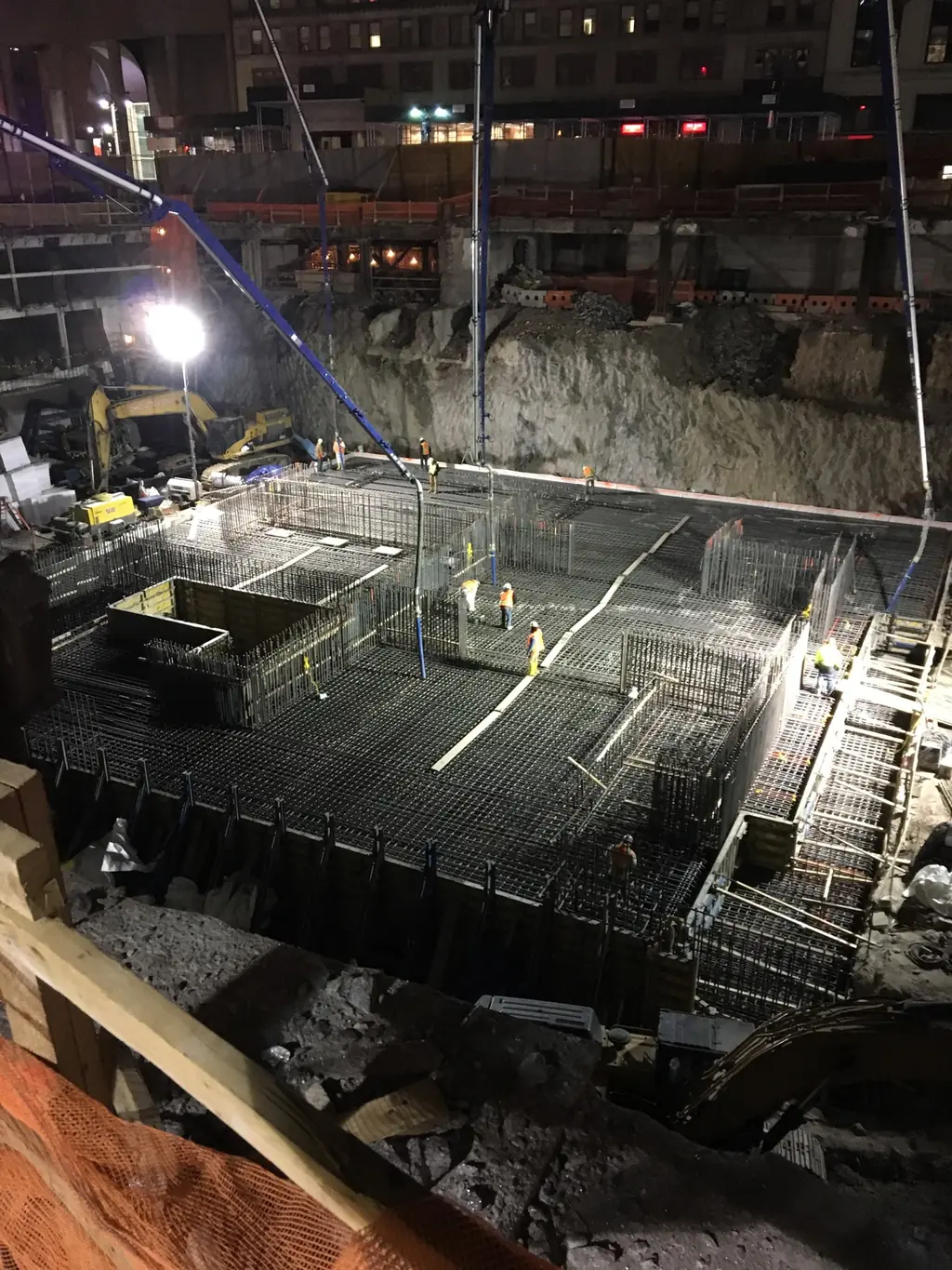 Lit foundation mat during a night mass pour